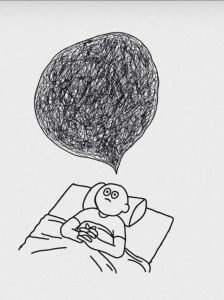 Es una ilustración en blanco y negro que muestra a una persona acostada en la cama, con los ojos muy abiertos y las manos sobre el pecho, mientras un gran garabato dentro de un globo de pensamiento representa una mente llena de preocupaciones o ideas desordenadas.